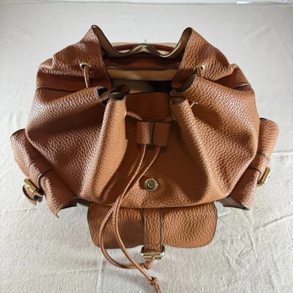 JustFab Brown Faux Leather Mini Backpack Purse Drawstring Flap Buckle Pockets